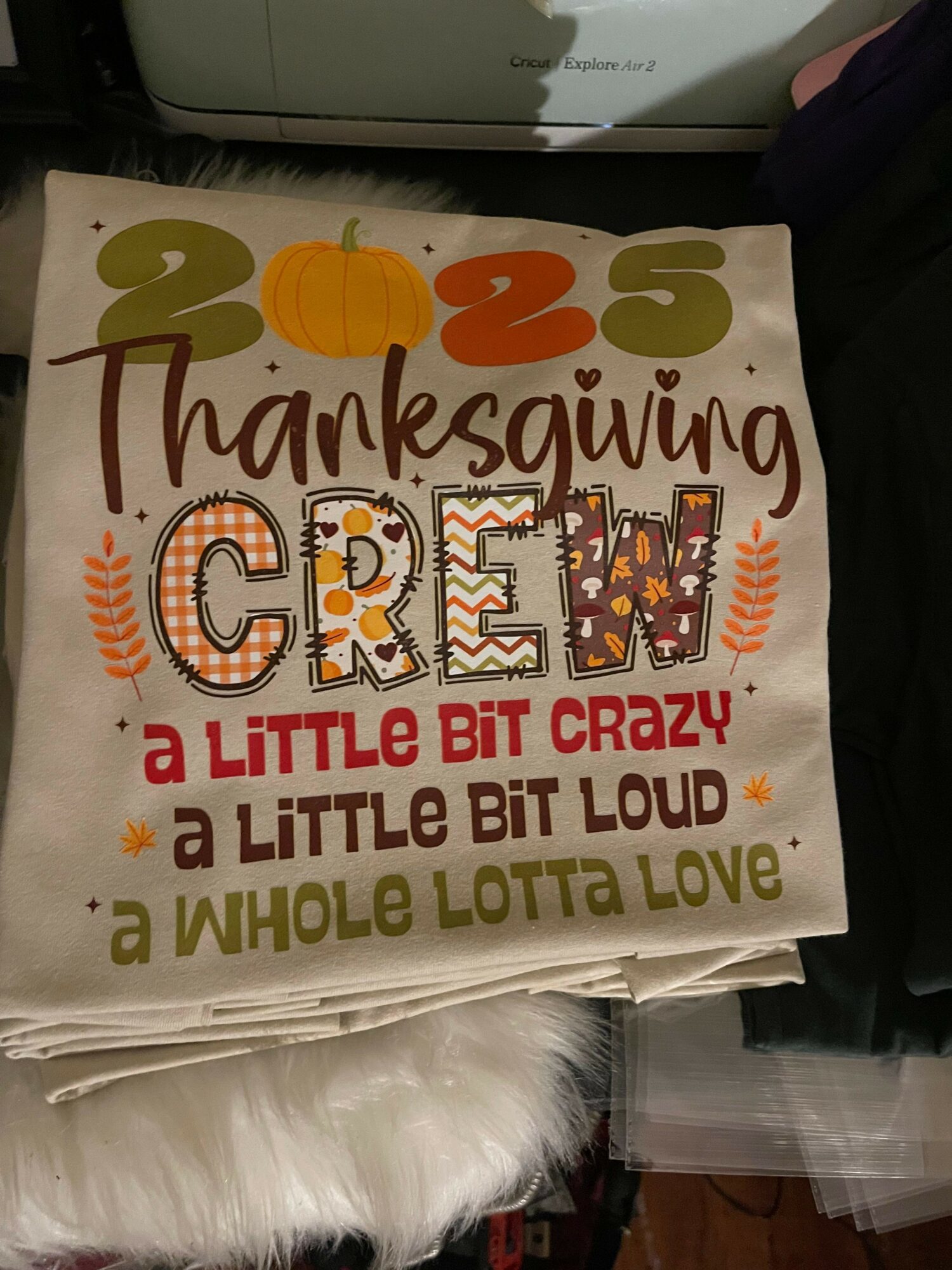 Thanksgiving-themed poster with colorful numbers, pumpkin, and text about creativity and love.