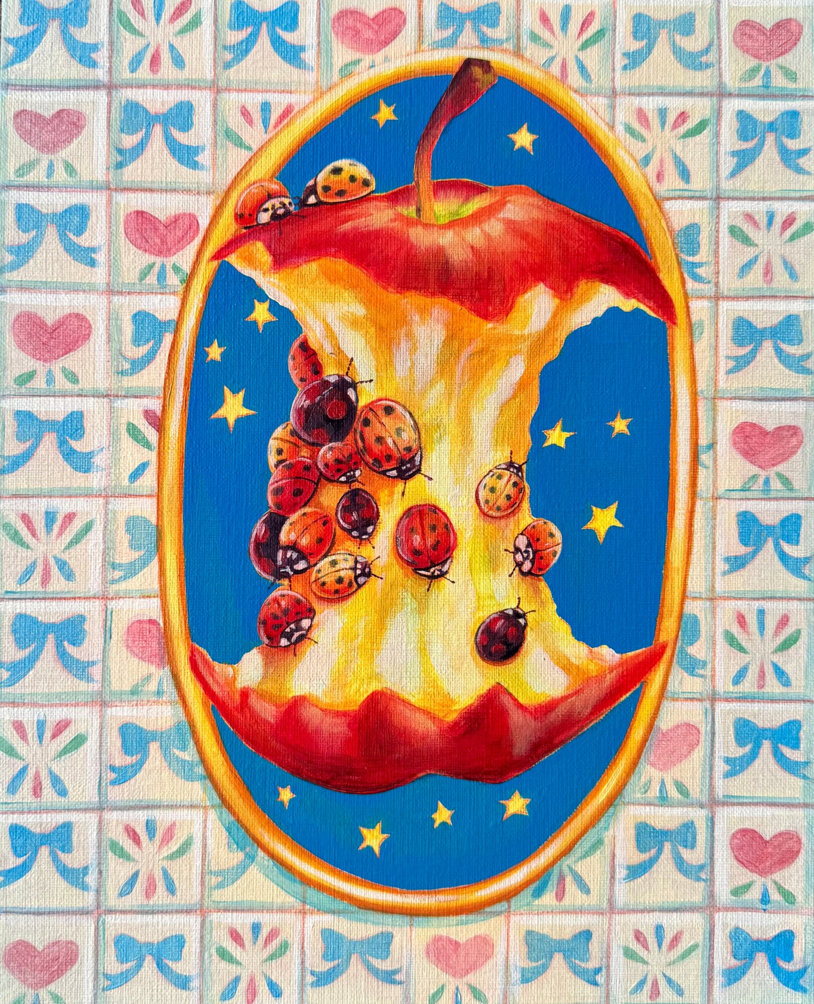 A colorful illustration of a sliced apple with berries inside, set against a blue background with yellow stars, surrounded by a decorative border.