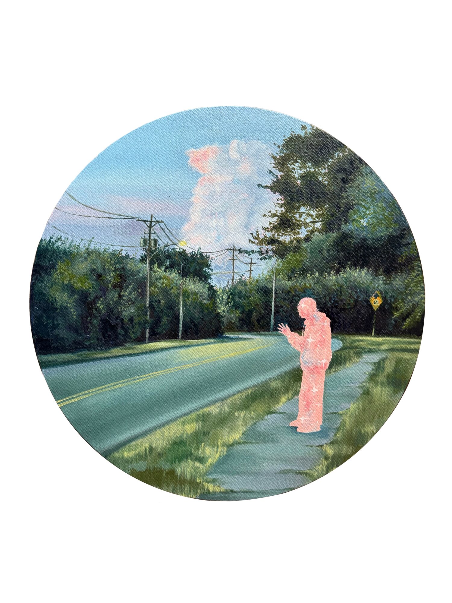 A person in pink standing on a sidewalk, looking at a phone, with trees and power lines in the background.