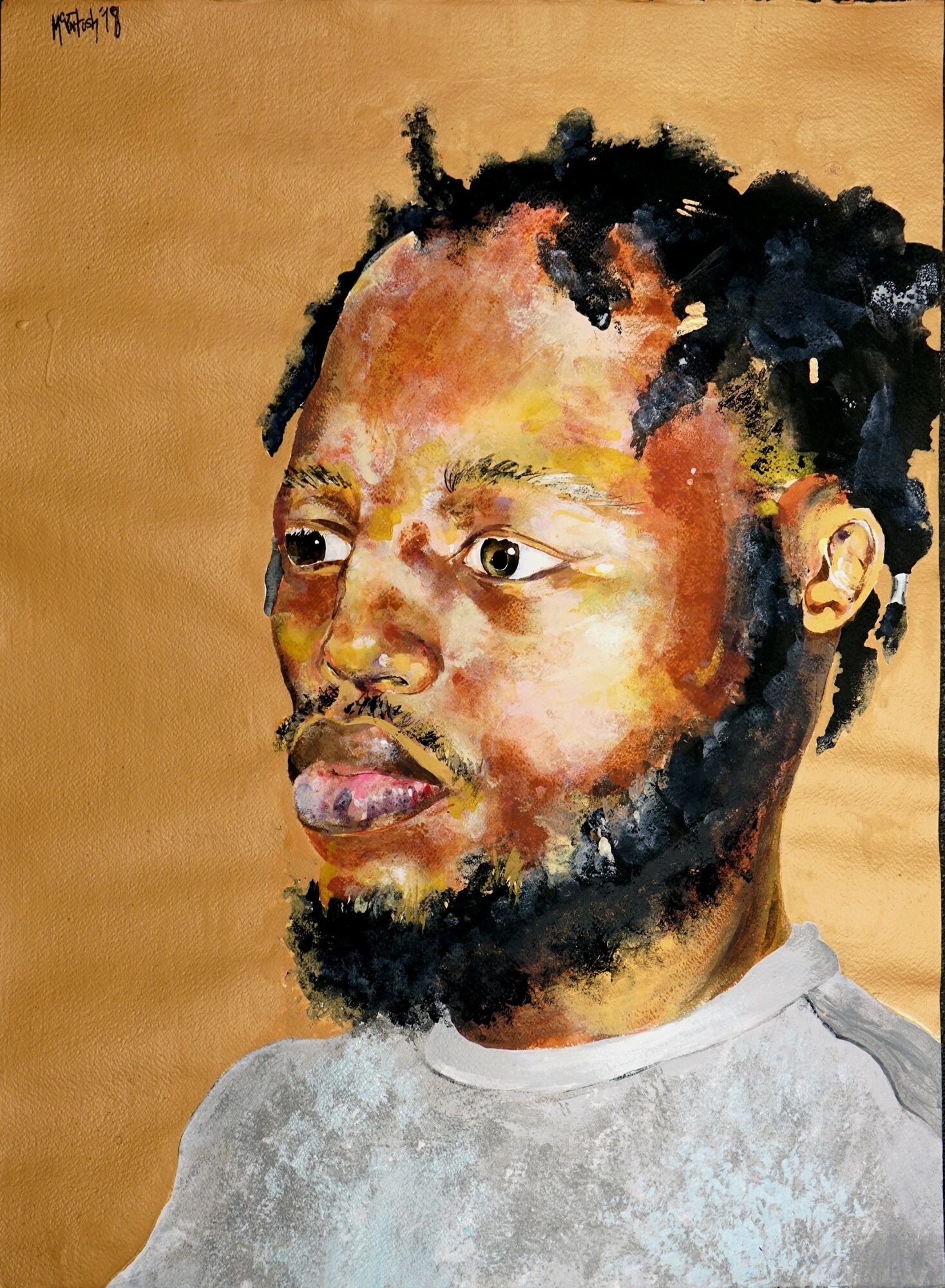 Portrait of a man with dreadlocks, beard, and mustache, wearing a light-colored shirt, against a beige background.